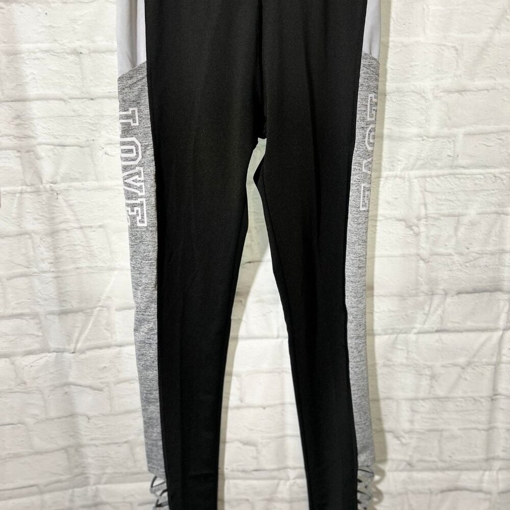 Leggings Featuring Strappy Ankles & Adorned with the Word "Love" on Both Sides